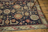 Intricate geometric border and historic corner wear on this collectible Antique Caucasian rug.