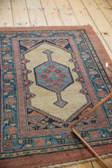 Warm camel hair texture and geometric patterns of an antique Persian Serab collector rug.