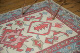 New Oushak rug corner with geometric Samovar-turtle, primitive blossom, red and blue borders.