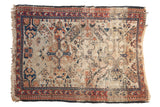 Antique Shirvan rug, ivory field, oversized medallions, meandering red and blue borders, storied patina.