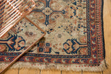 Antique Caucasian Shirvan rug corner with ivory ground, reciprocating pawn border, and tattered fringe.