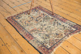 Antique Shirvan rug with scarce ivory ground, geometric pawn border, and worn fringe.