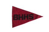 Vintage red felt BHHS pennant with bold black letters and aged texture, 6
