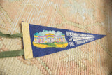 Vintage Benjamin Franklin pennant's blue felt tip, showing white text and light creasing.
