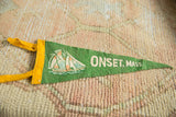 Green felt vintage Onset, Mass. pennant with yellow tie, sailboat, and white text.