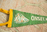 Vintage green felt pennant with white ONSET lettering, sailboat graphic, and yellow trim.