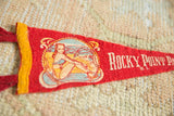 Textured red felt pennant with white 