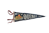 Vintage Quebec Canada felt flag pennant in blue with a colorful Chateau Frontenac graphic.