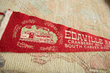 Texture of the vintage red felt pennant with Edaville steam train and cranberry sprigs.
