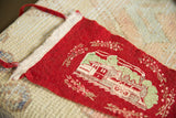 Red felt Edaville Railroad pennant with steam train, cranberry sprigs, and white edge.