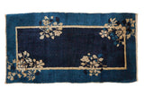 Antique Chinese Peking runner, indigo field with double beige border and floral sprays, 2x3'9