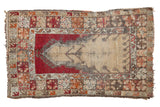 Vintage Melas prayer rug with beige field, cherry red, tangerine, and muted silver tones.