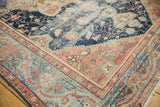 Farahan Sarouk antique carpet border featuring terra cotta, powder blue, navy vines, with mostly even wear.