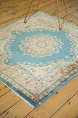 Vintage Kerman rug's blue side selvage, revealing a localized pull.