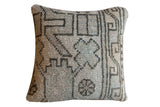 Reclaimed Turkish Oushak mini pillow, light gray, faded purple-pink, mint geometric motifs.