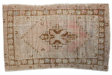 Distressed Oushak rug with stepped diamond medallion, faded dusty rose, ivory, bronze. 2'10