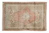 Vintage distressed Oushak rug, dusty rose medallion, muted beige tones, even wear, 2'4