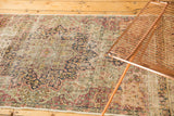 Worn pile on antique Persian Kerman runner, ivory, red, and navy floral blossoms.