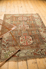 Antique Caucasian rug, geometric rams horn designs, rectilinear knot patterns, copper, rust, ivory.