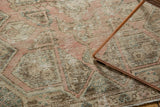 Vintage Distressed Oushak rug texture with faded geometric design in dusty rose, pale green.
