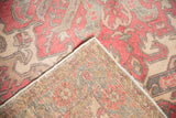 Vintage distressed Oushak carpet corner revealing even wear and hand knotted foundation.