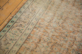 Distressed Oushak carpet with pale apricot, ivory, mint green floral pattern and exposed foundation.