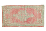 Pale raspberry and seafoam distressed Oushak rug runner with scalloped medallion, 2'2