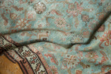 Distressed Malayer runner showing Herati pattern, stepped border, and muted tones.