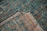 Worn sapphire blue and wine red Herati design on antique Mahal fragment rug, showing foundation.