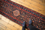 Vintage Persian Dargezine runner: hexagonal center medallion, Herati motif, navy, madder red.