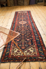 Vivid madder root red border and navy blue Herati motif on a vintage Dargezine runner.
