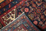 Vintage Dargezine runner showing its fine hand-knotted foundation, white fringe, and rich navy border.