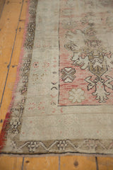 Distressed Oushak rug runner, worn dusty rose pile, antique ivory main border.