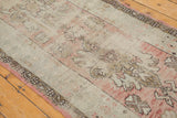 Vintage Distressed Oushak Rug Runner section with muted dusty rose, antique ivory, and bronze patterns.