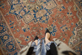 Distressed vintage Oushak carpet with scrolling vinery, serrated leaves, dusty red, sky blue.
