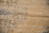 Distressed Oushak texture, even wear to knot heads, faint foundation, beige, pale blue, seafoam green.
