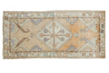 Distressed Oushak runner, diamond medallion, halved palmettes, in pale gold, ivory, and seafoam, 2'7