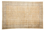 Vintage Distressed Oushak carpet with faded pale gold field, blue vinery, and textured wear.