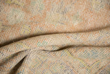 Hand-knotted reverse of vintage Oushak rug, showing pale apricot, blue, green knot texture.