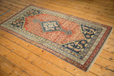 Antique Malayer rug with abrash-rich madder root red field, navy accents, and even knot-head wear.