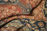 Antique Malayer rug detail: rich abrash, germinating shrub motifs in dusty rust and navy.