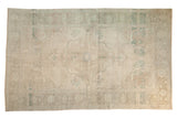 Vintage distressed Oushak carpet with oversized medallion, muted beige and sea foam green, 5'3