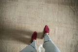Distressed vintage Oushak rug runner with low pile and subtle ivory and oxidized silver patterns.