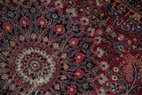 Cherry red Meshed rug: intricate floral vinery, palmettes, and even pile wear visible.