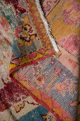 Original poly-chrome side cord selvages and hand-knotted weave of a circa 1910s Anatolian rug.