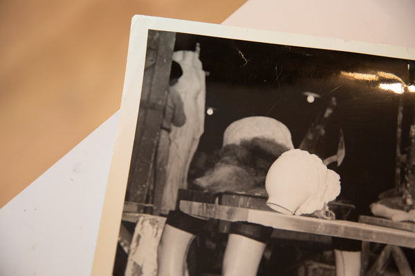 Corner detail of the vintage Hitchcock movie still showing its aged paper and white border.