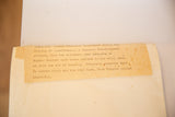 Close-up of aged vintage note with typewritten film details for Spellbound.
