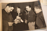 The aged paper and worn corners of the vintage Ingrid Bergman candid photograph.