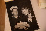 Angled view of the vintage Ingrid Bergman photograph showing its physical paper surface.
