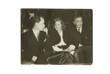 Vintage candid photograph of Ingrid Bergman conversing with husband Peter Lindstrom and David Selznick.